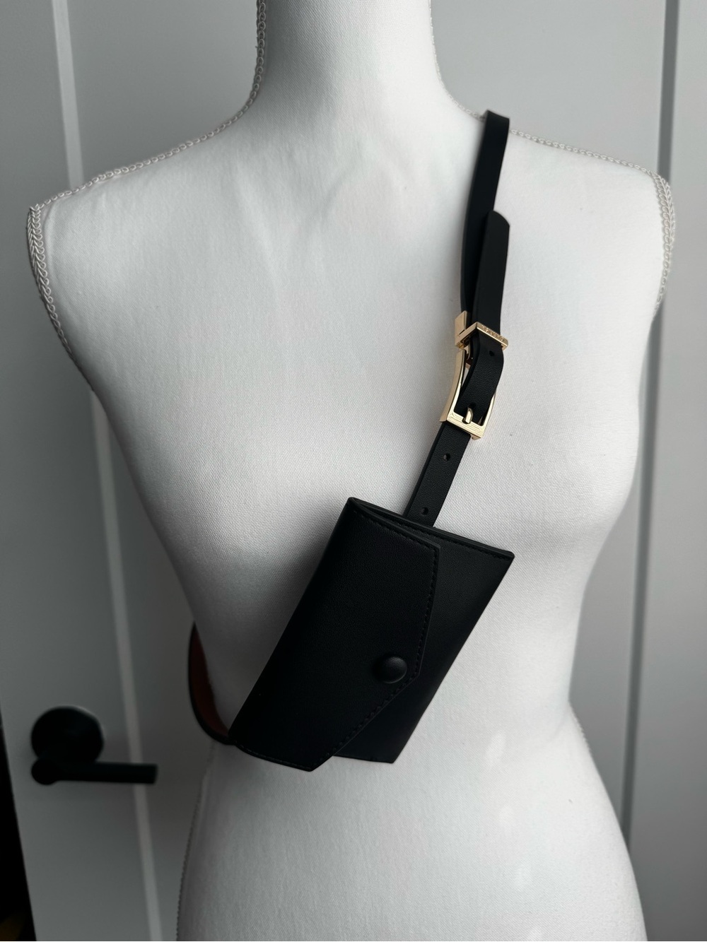 Sleek Black Mini Crossbody Belt Bag with Gold Buckle